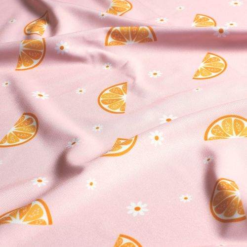 Tissu maillot de bain oranges fond rose UPF50 