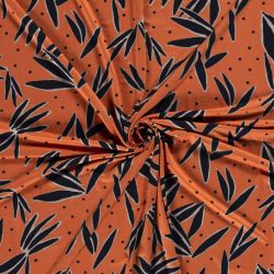 Tissu jersey viscose fleurs fond orange